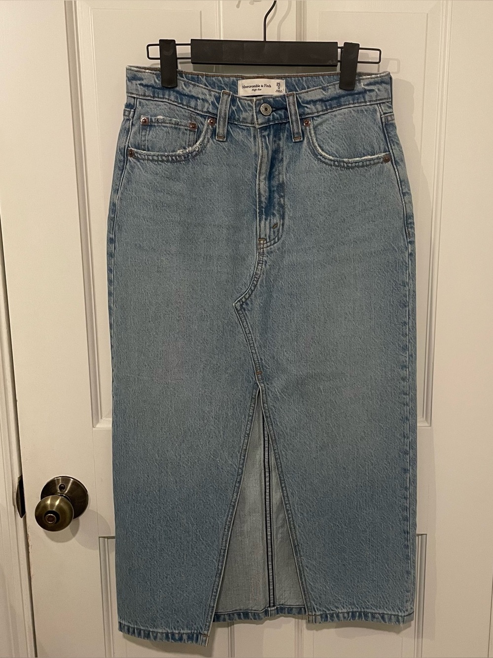 Abercrombie & Fitch blue denim midi skirt with slit, size 25/0
31” length